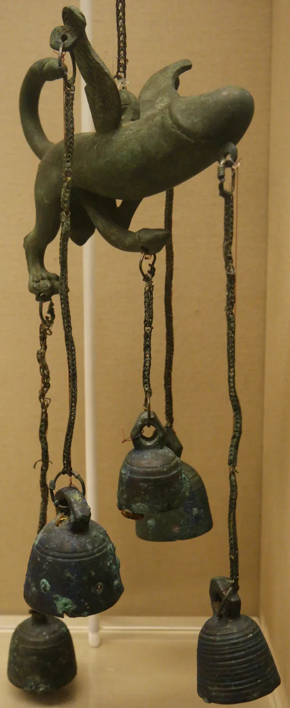 A first-century bronze tintinnabulum in the British Museum: a winged phallus hung with bells